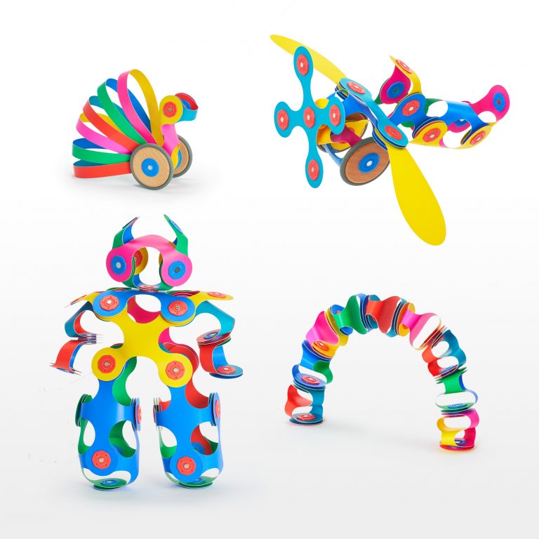 Clixo Wheel Creator Pack with various rolling toy creations made of colorful magnetic pieces.