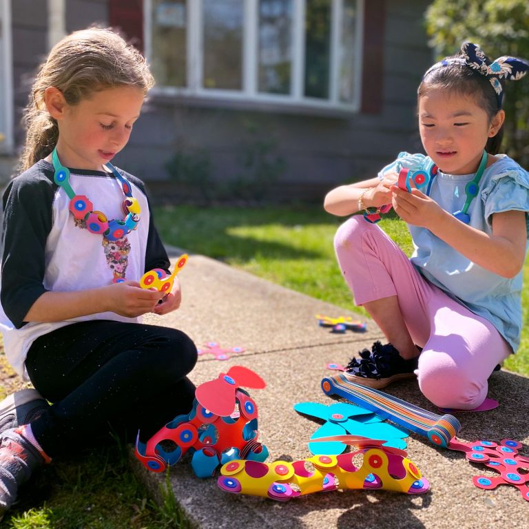 Clixo Super Rainbow Pack with various colorful magnetic toy structures showcasing 60 pieces.
