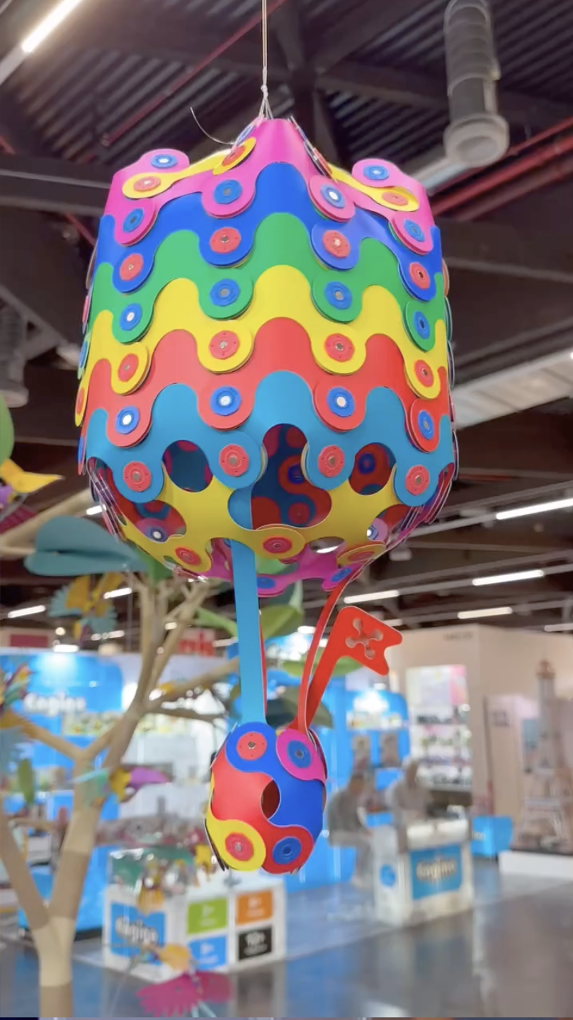 Video of a colorful Clixo hot air balloon structure in a toy store setting.