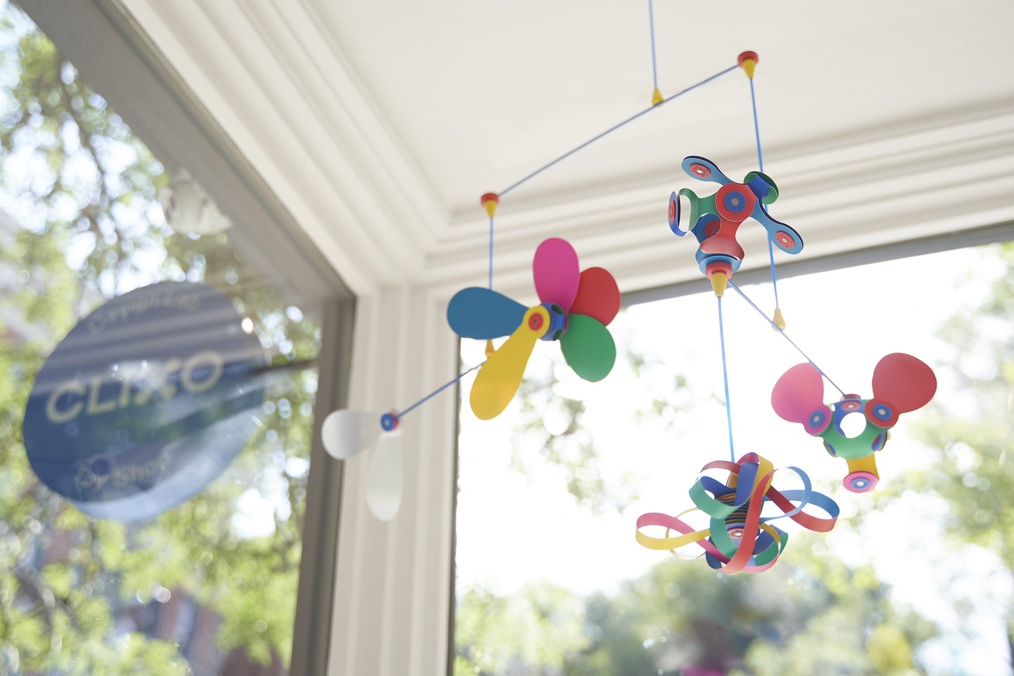 The Clixo mobile is gracefully hanging in our Brooklyn store, creating a playful and interactive atmosphere